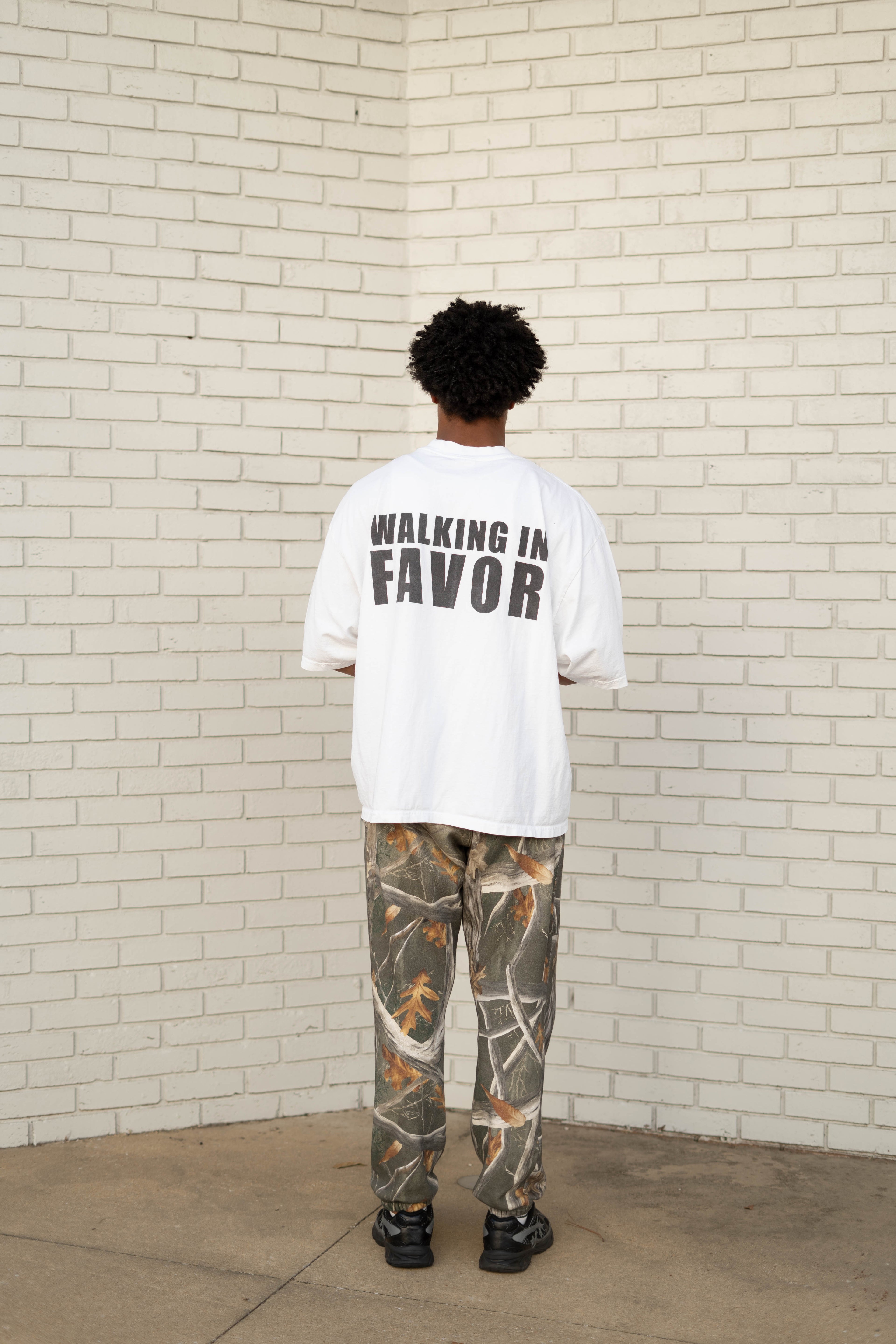 Drop-Shoulder WALKING IN FAVOR Oversized T-Shirt (Black Text)
