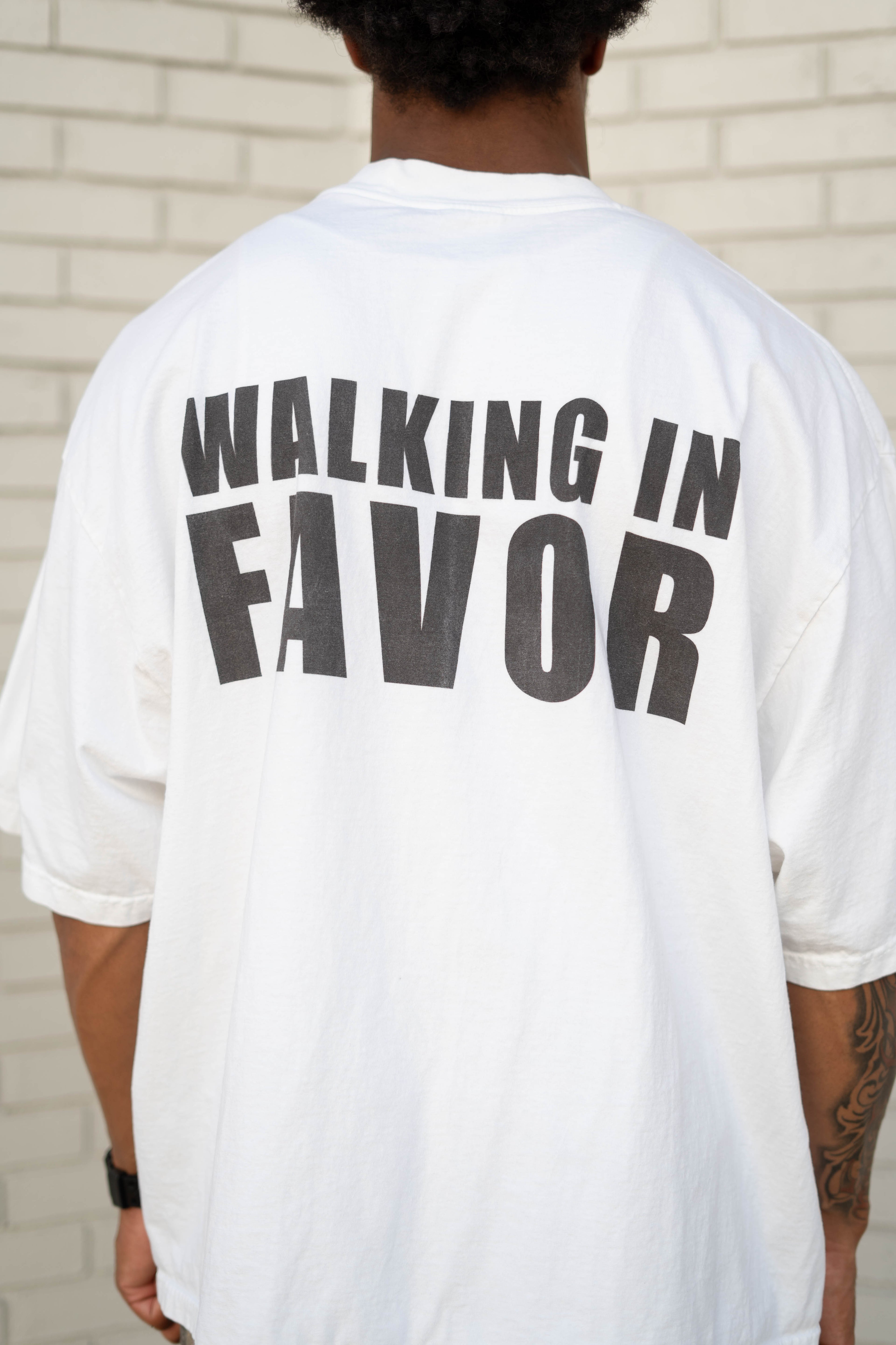Drop-Shoulder WALKING IN FAVOR Oversized T-Shirt (Black Text)